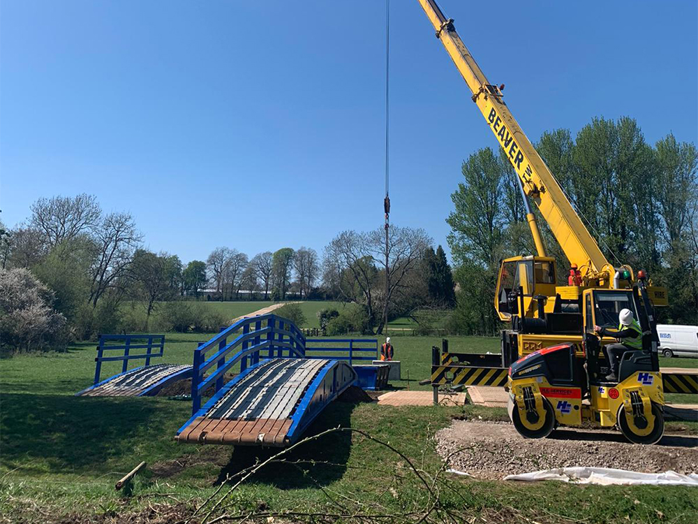 beaver bridges tank bridge install - with yellow crane